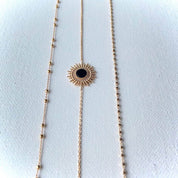 Trio de bracelets chaîne et motif soleil en plaqué or