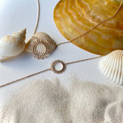 Collier et bracelet anneau soleil plaqué or