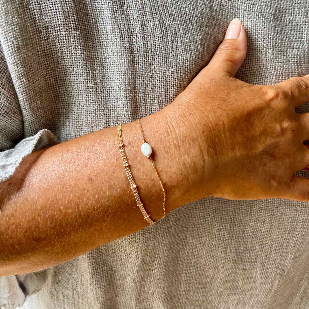 Bracelet double chaine reliée plaqué or