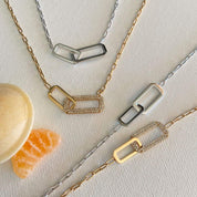 Composition de bracelet et collier maillons rectangles