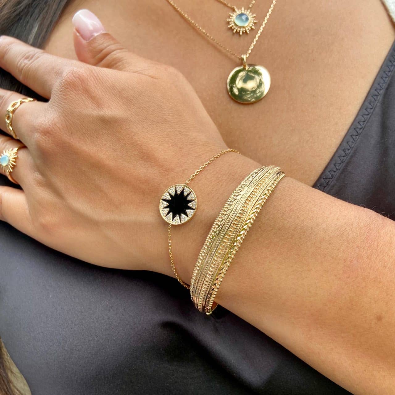 Bracelet plaqué or soleil noir