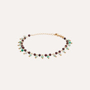 Bracelet plaqué or à perles enfilées vert d’eau et bordeaux, chaîne délicate