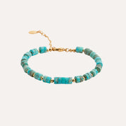 Bracelet plaqué or avec perles bleues et turquoise, fermoir à maillons