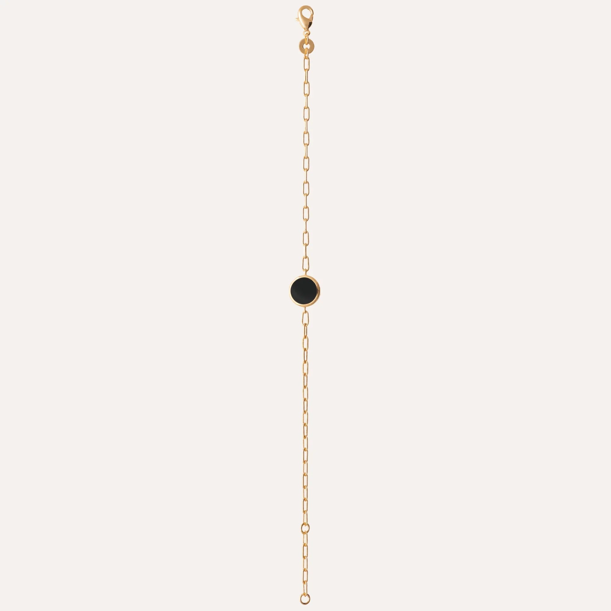 Bracelet plaqué or en chaîne fine avec cabochon rond d’agate noire