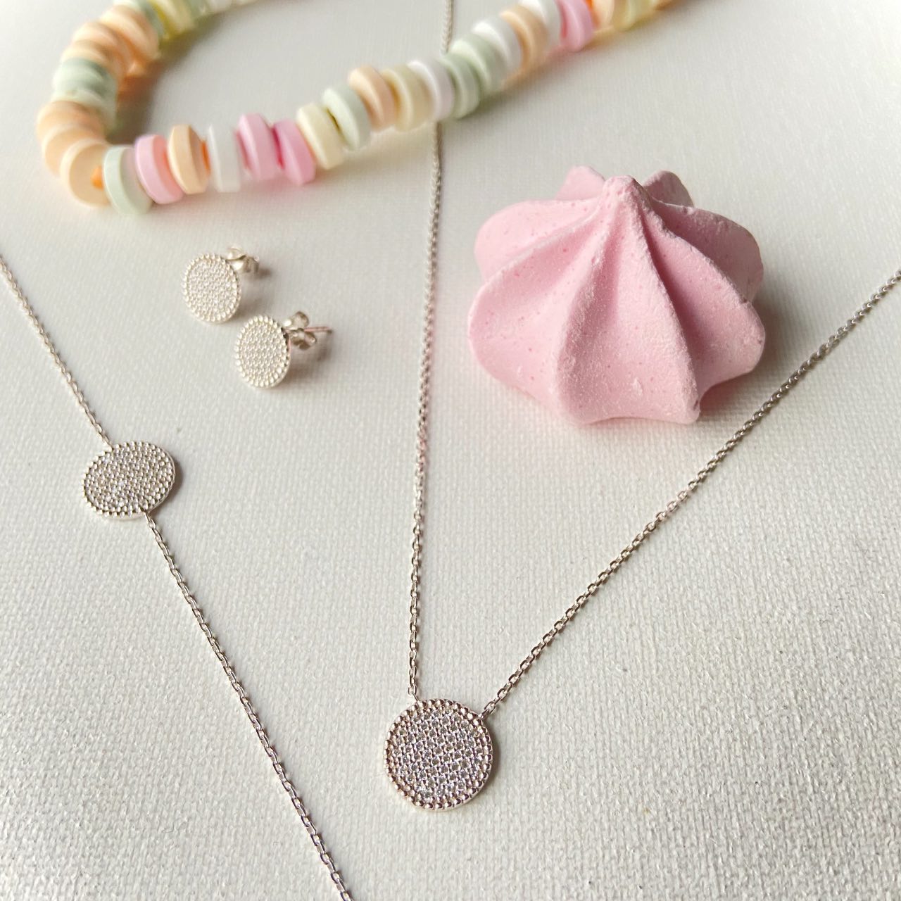 composition bijoux en argent et zirconium avec bonbons