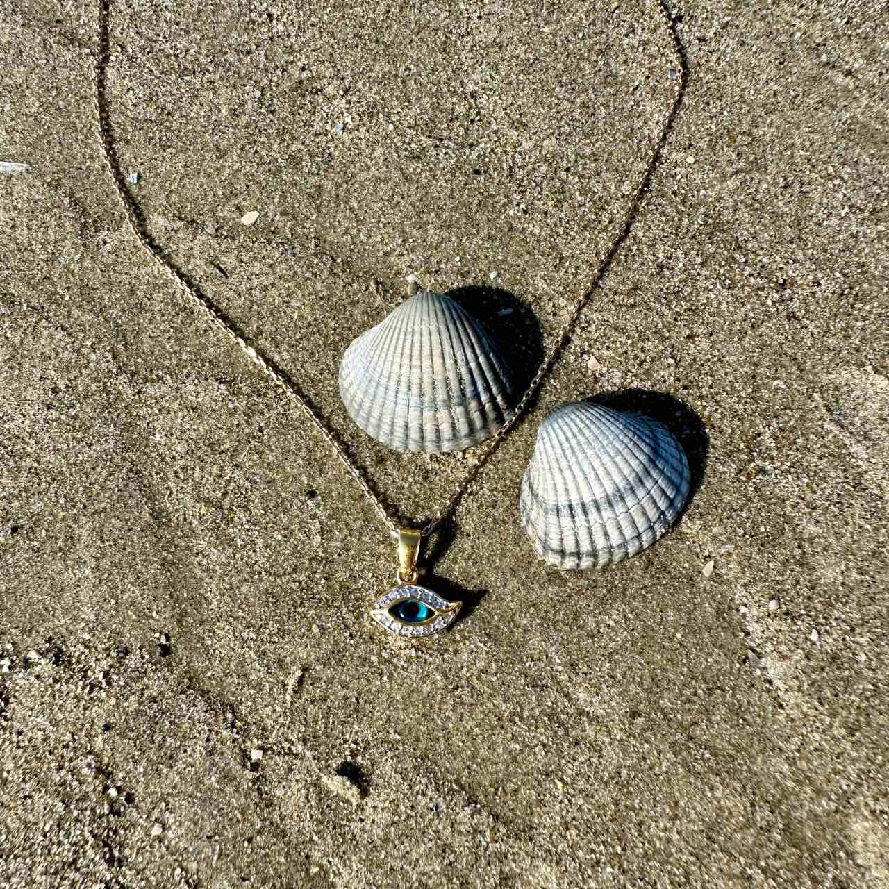 Chaîne + pendentif plaqué or oeil bleu