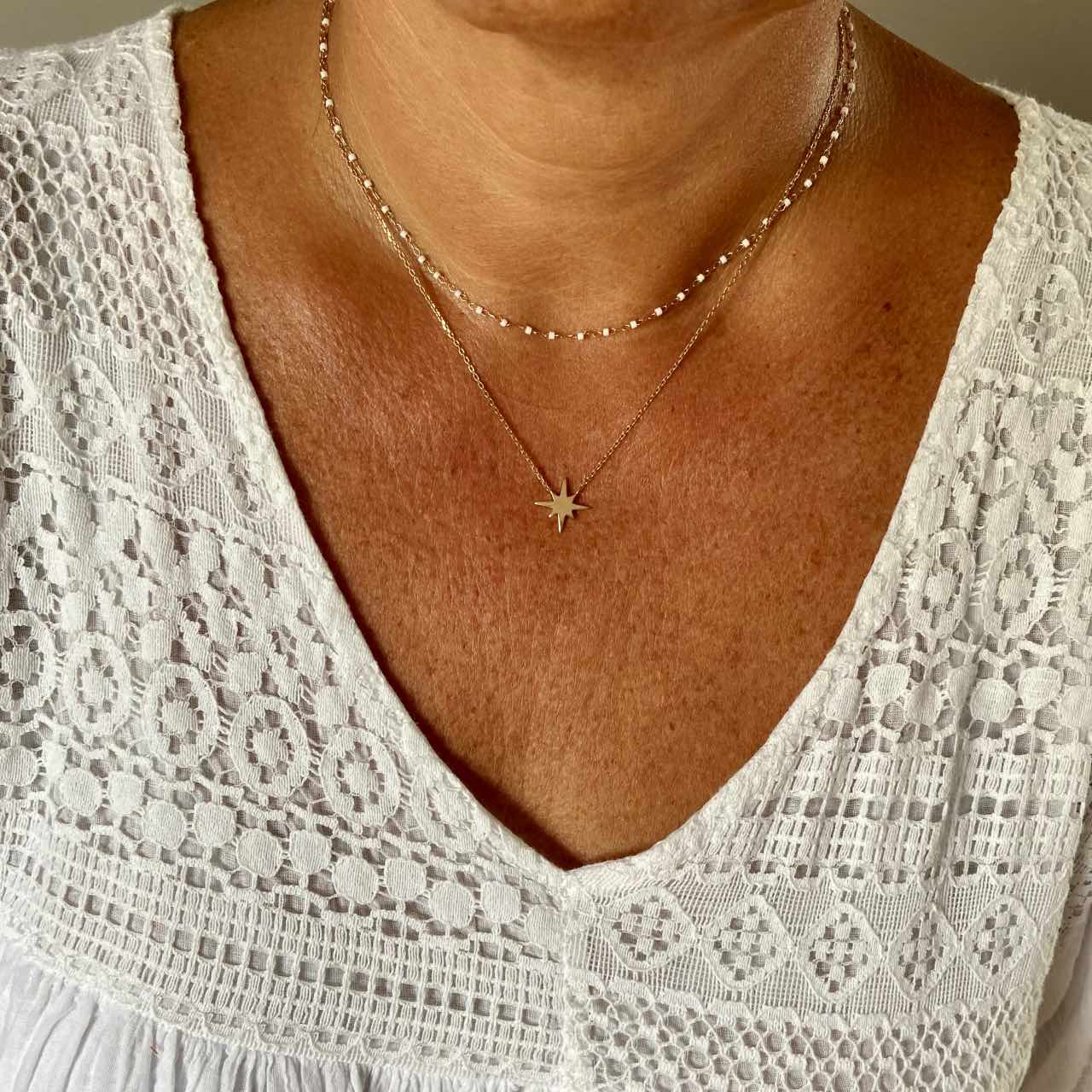 Collier étoile 8 branches plaqué or