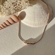 collier plaqué or talisman cylindre