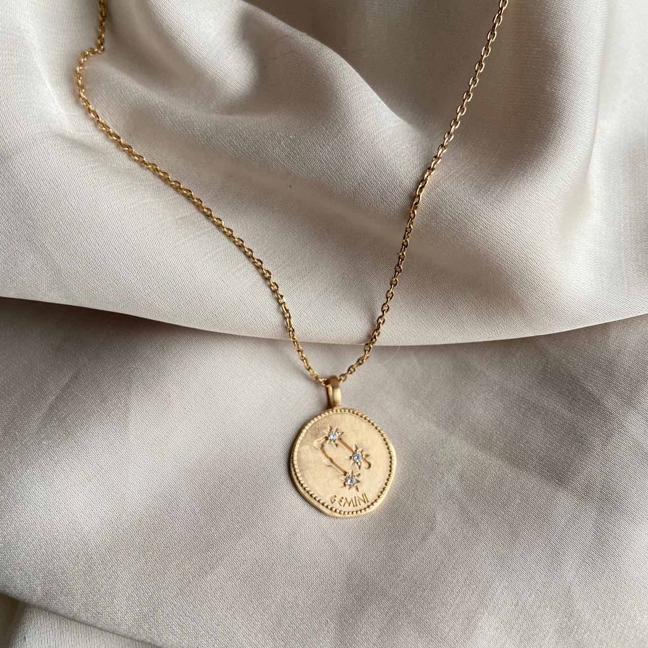 Collier pendentif gémeaux