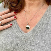 Chaine et médaille soleil en argent