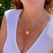 Collier pendentif médaille perlée plaqué or