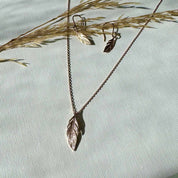 Collier pendentif femme plaqué or plume