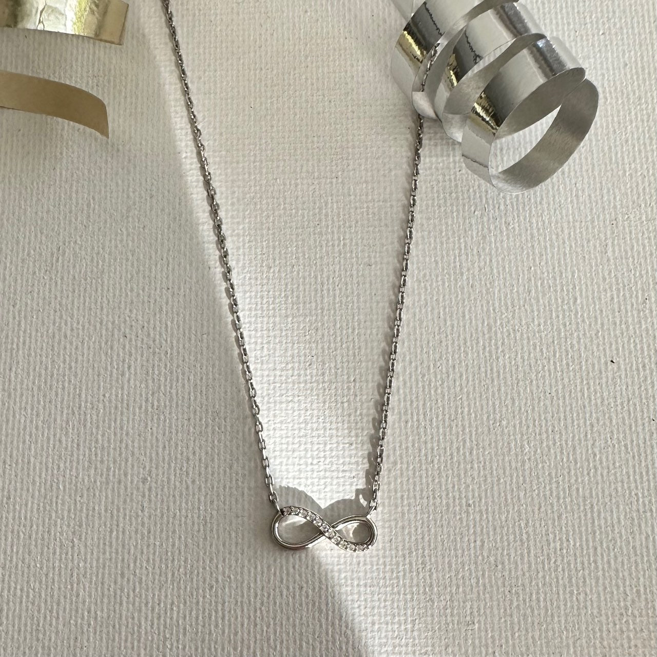 Collier_argent_infini_zirconium.jpg