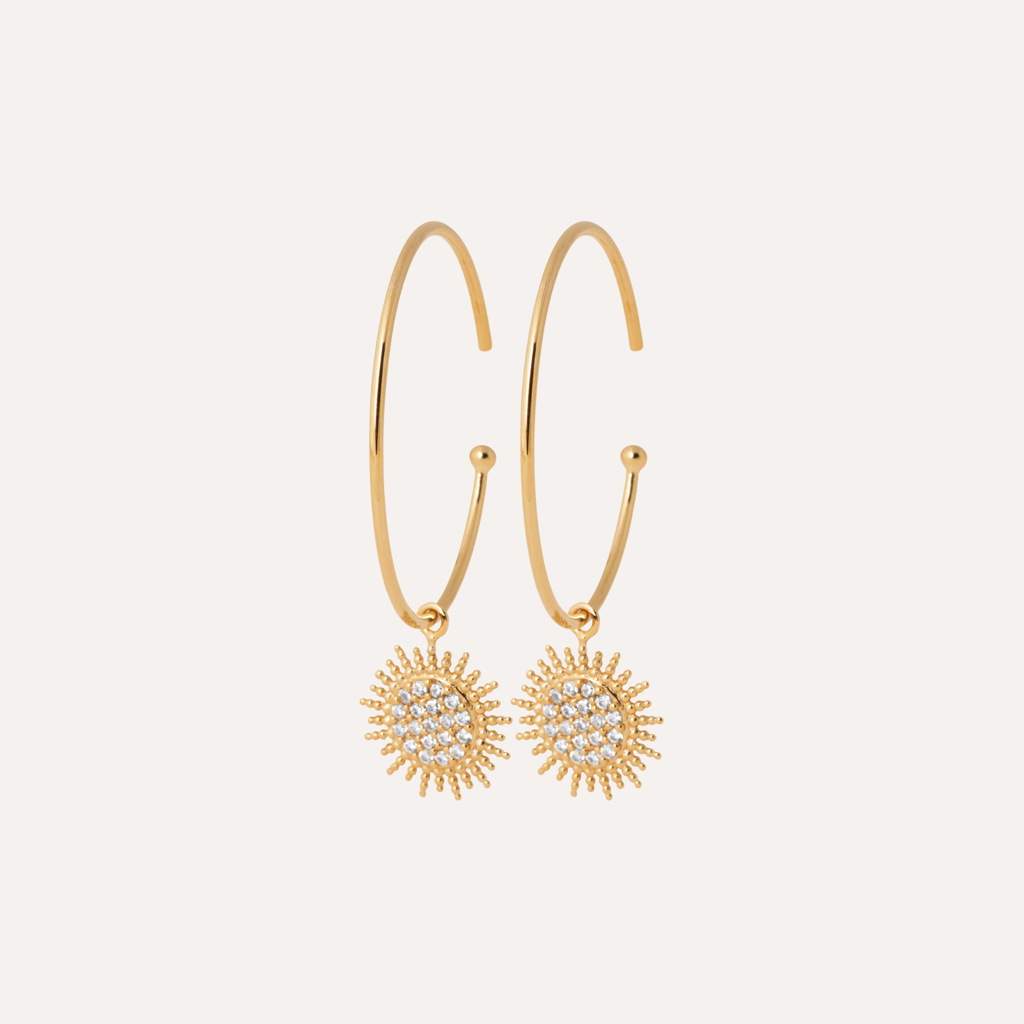 Créoles plaqué or soleil