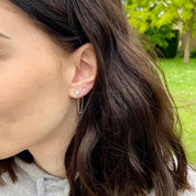 Double boucle d'oreille étoile argent à l'unité