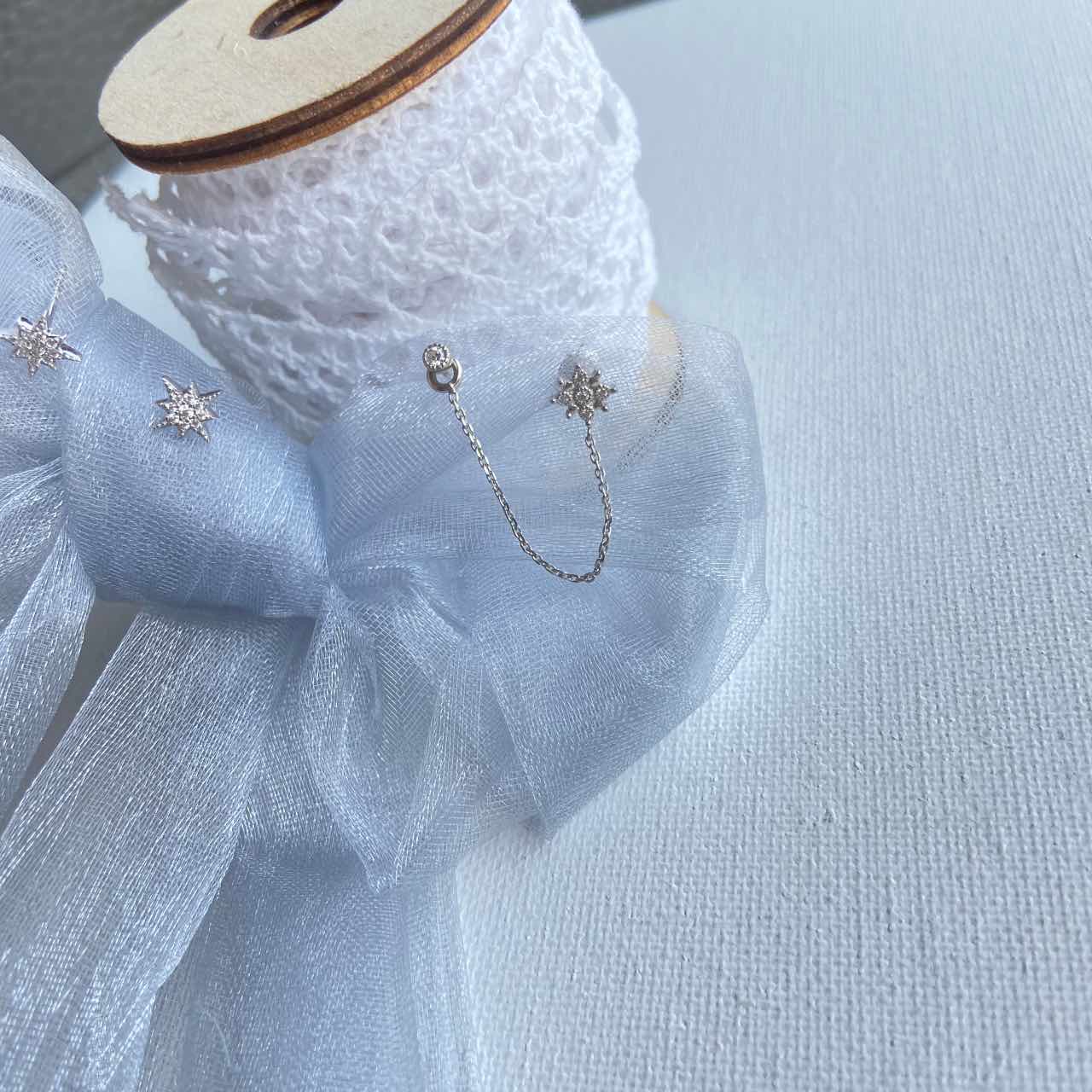 Double boucle d'oreille étoile argent à l'unité