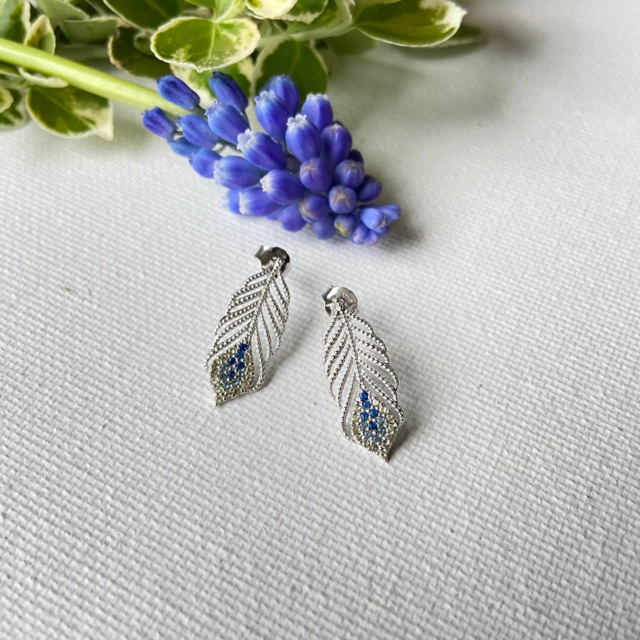 Boucles d'oreilles Plume zircon bleu