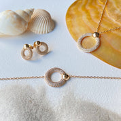 Bijoux sphère plaqué or et zirconiums