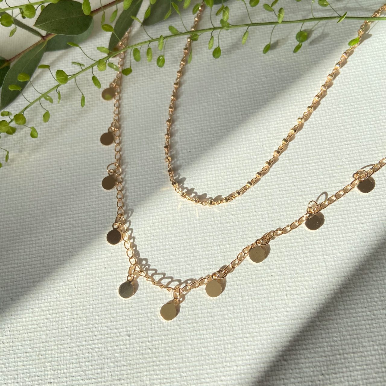 deux colliers femme plaqué or