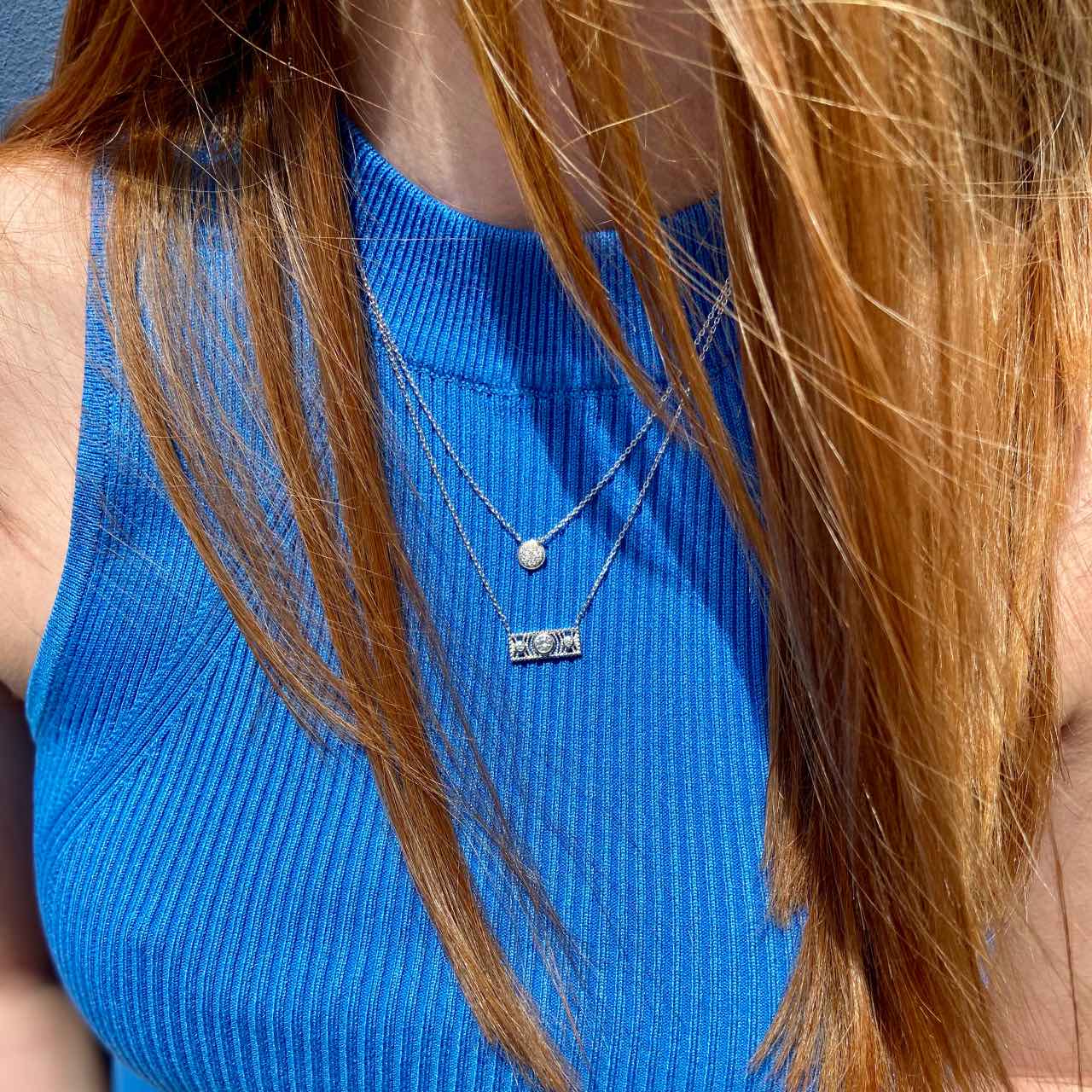 collier porté en argent barette de zirconium