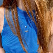 collier porté en argent barette de zirconium