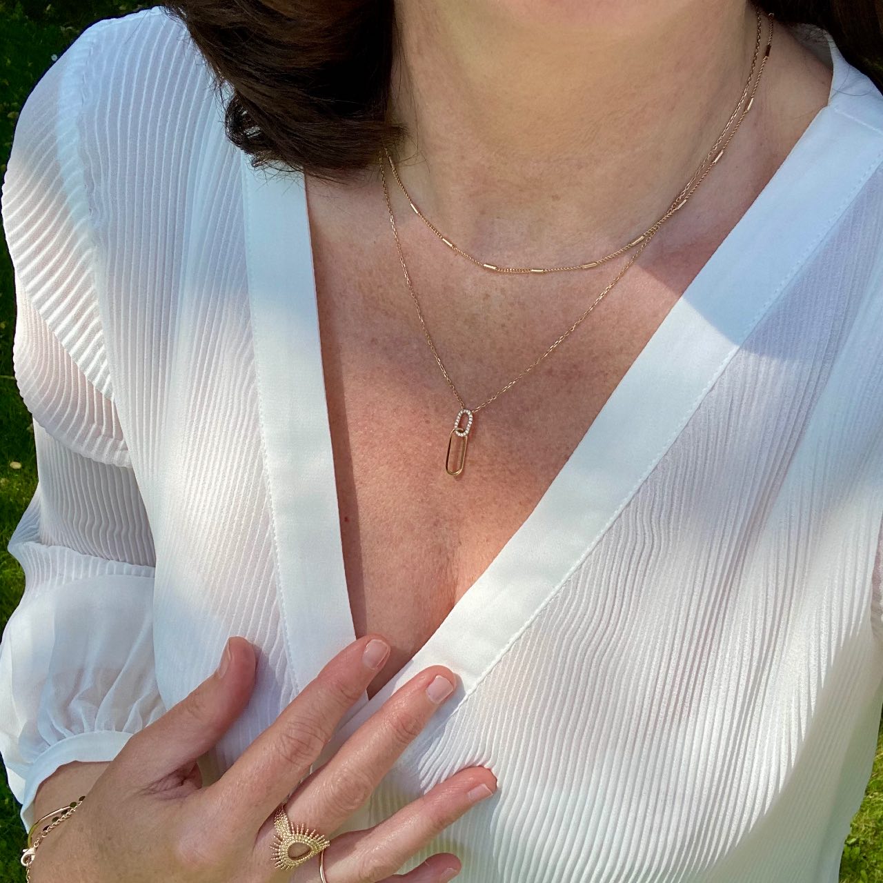 Collier plaqué or deux anneaux entrelacés