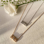 Composition de 2 colliers barette argent et plaqué or