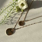 Colliers avec Pendentif médaille perlée plaqué or