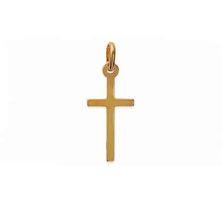 gros plan pendentif croix en plaqué or