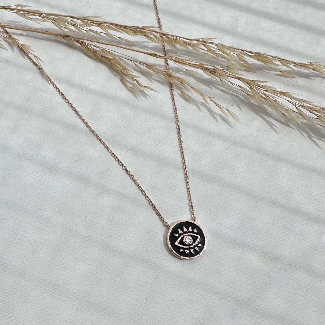 Collier mauvais oeil plaqué or